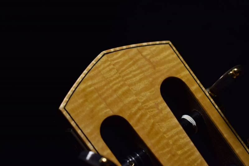 Figured Maple binding with black purfling 