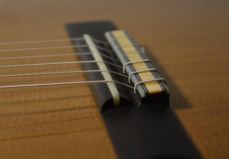 Ziricote bridge with 12 hole tie block