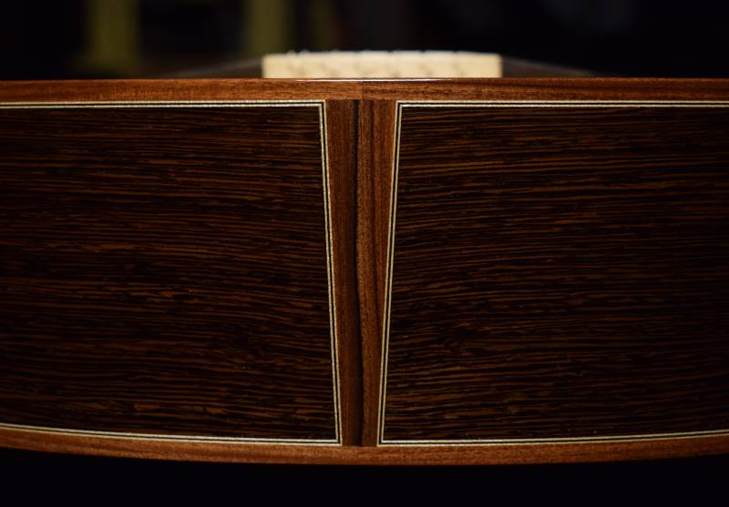 Binding and end graft is Bolivian rosewood