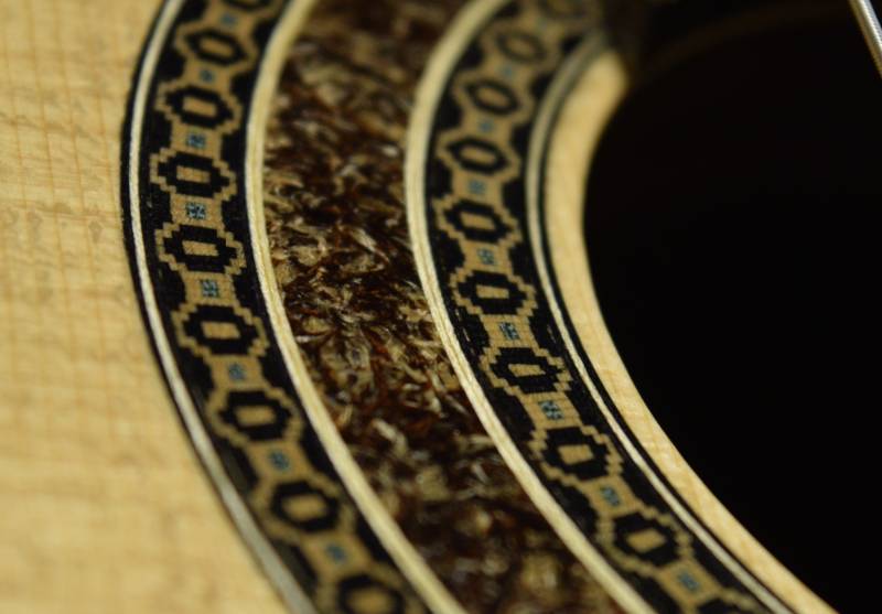 Chaos surrounds order - the conglomerate inner ring surrounded by a traditional mosaic border.